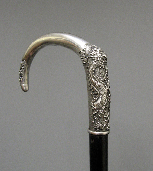 Cast Silver Dragon Cane. Ebony shaft. China or Vietnam 19th century.