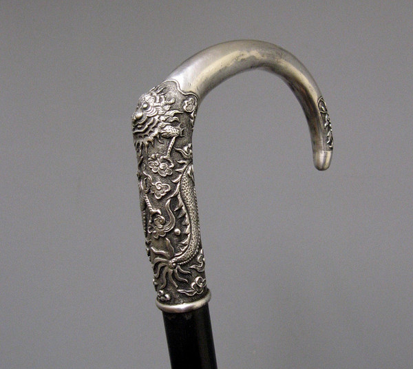 Cast Silver Dragon Cane. Ebony shaft. China or Vietnam 19th century.