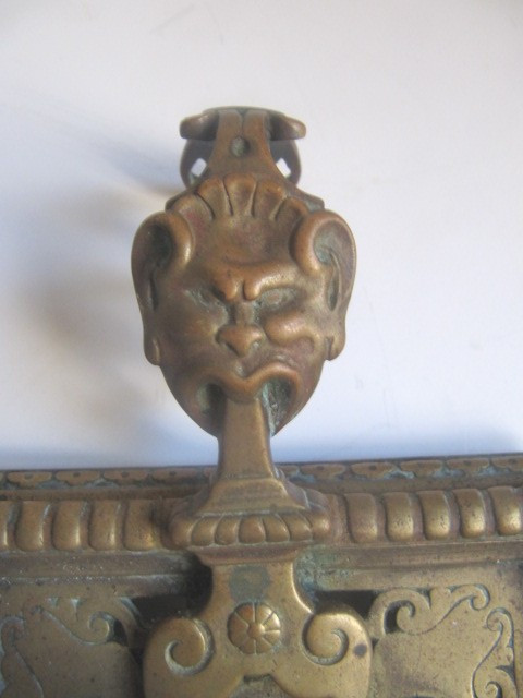 Gilt bronze hand candlestick with grotesque fauna head 19th century