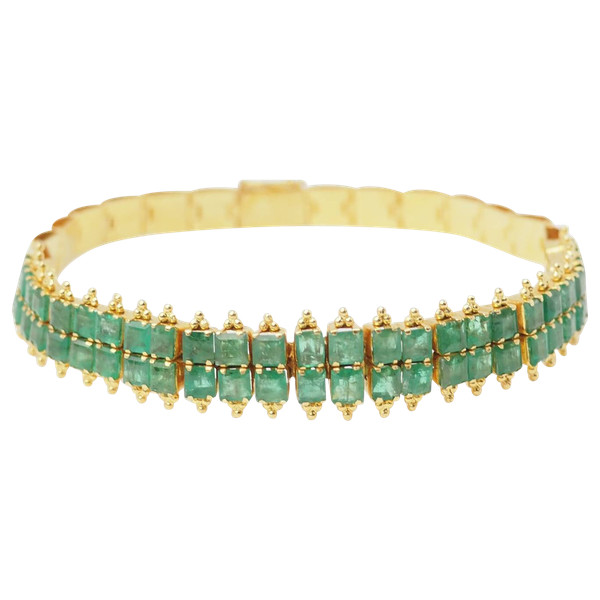 Antique flexible bracelet in yellow gold and emeralds