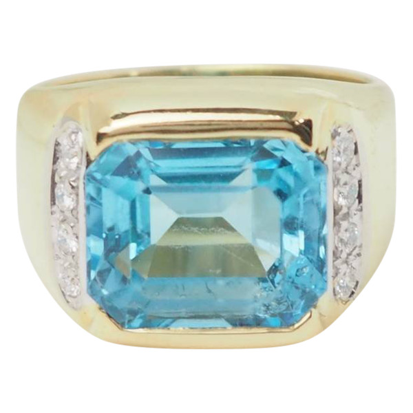 Yellow gold, blue topaz and diamond ring