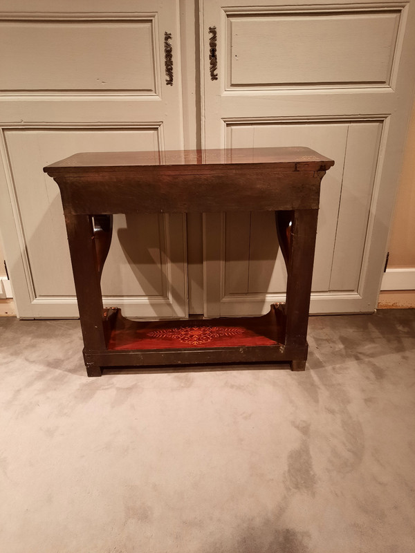 Charles X period console in mahogany and sycamore.