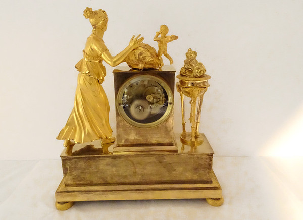 Empire Naissance De l'Amour gilt bronze clock Athenian vestal XIXth century