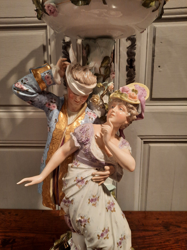 Porcelain group representing two 20th century figures.