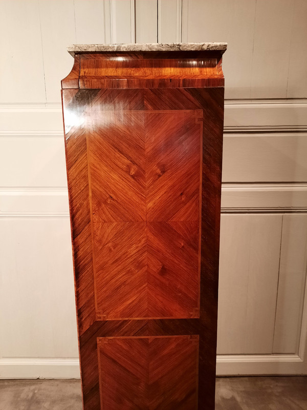 Louis XVI period marquetry weekly cabinet.