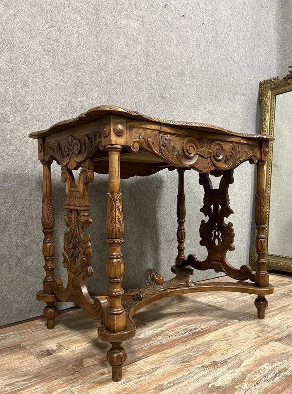 double-sided Renaissance desk in walnut carved with plant motifs