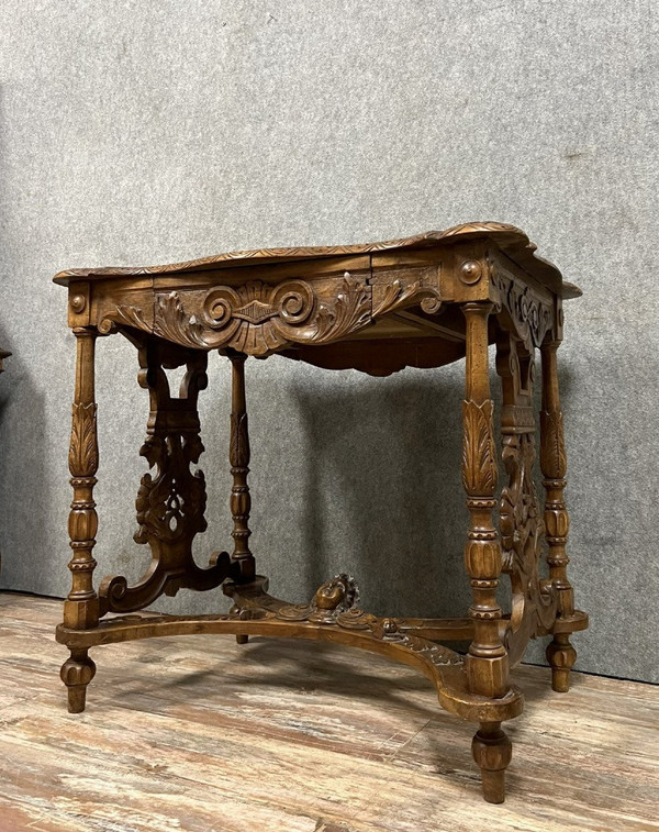 double-sided Renaissance desk in walnut carved with plant motifs