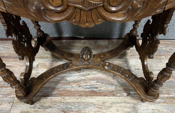 double-sided Renaissance desk in walnut carved with plant motifs