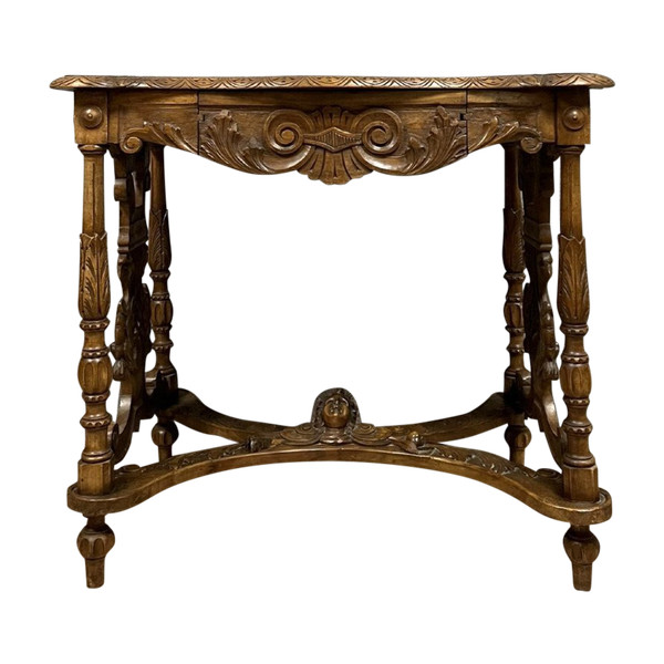 double-sided Renaissance desk in walnut carved with plant motifs