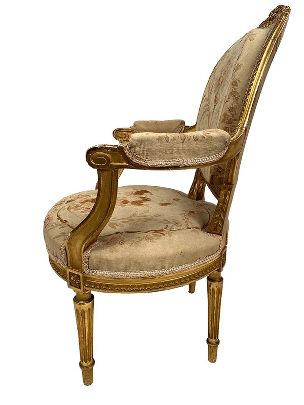 Louis XVI style giltwood armchair, late 19th or early 20th century