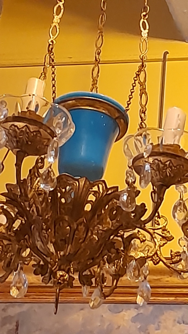 Brass alcove chandelier and blue opaline bowl