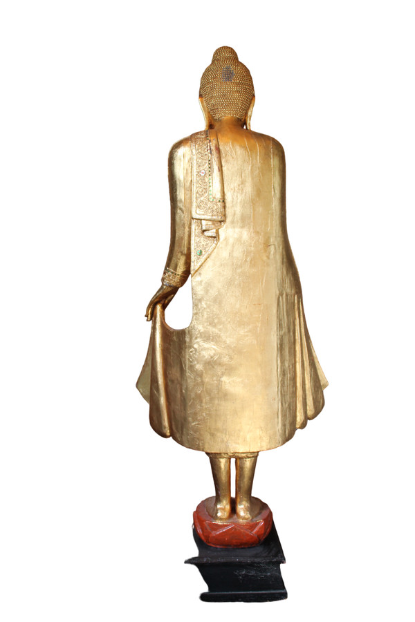 A large standing Buddha in gilded and inlaid wood, Thailand, 20th century 