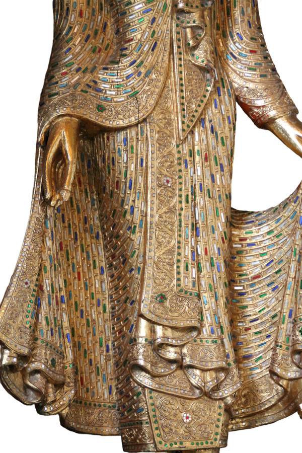 A large standing Buddha in gilded and inlaid wood, Thailand, 20th century 