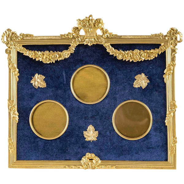 A Louis XVI style gilt bronze photo frame, late 19th century