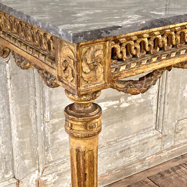 Louis XVI period console in gilded wood