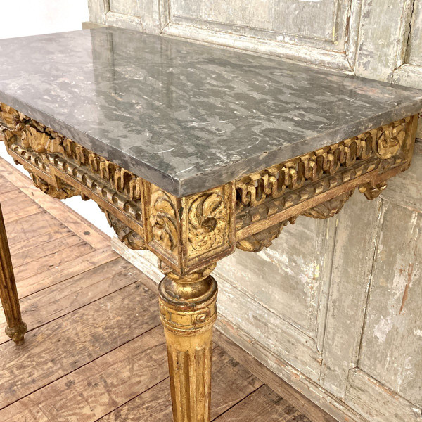 Louis XVI period console in gilded wood