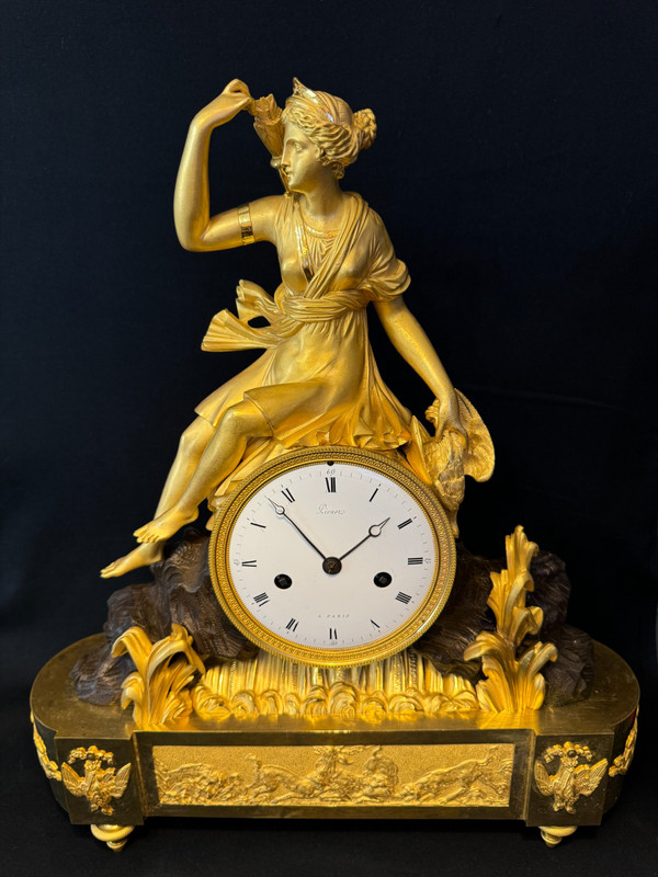 Grande orologio "Diana cacciatrice" in bronzo dorato stile Impero