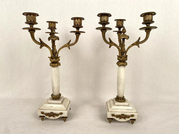 Pair of ormolu and white marble candelabra in the Louis XVI style