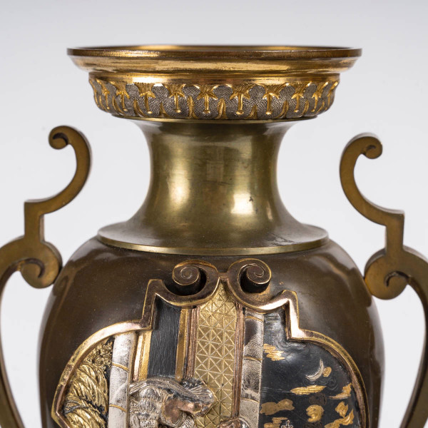 A pair of late 19th century polychrome bronze vases 