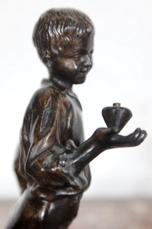  Bronze " Boy with a spinning top " - End of 19th century