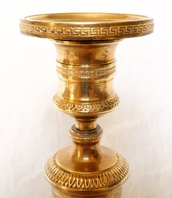 Pair of Empire period gilt bronze candlesticks / torches attributed to Claude Galle