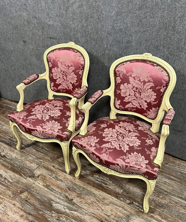 pair of Louis XV style cabriolet armchairs in lacquered and carved wood circa 1900