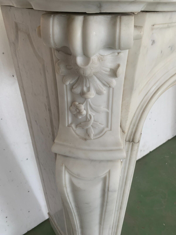 Louis XV style mantel in white Carrara marble XIX century