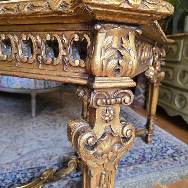 Table de milieu de style Louis XIV en bois doré, époque XIXème.