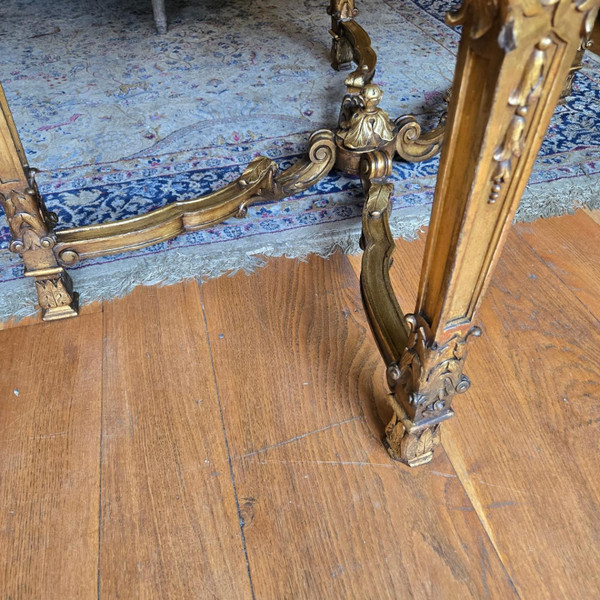 Table de milieu de style Louis XIV en bois doré, époque XIXème.