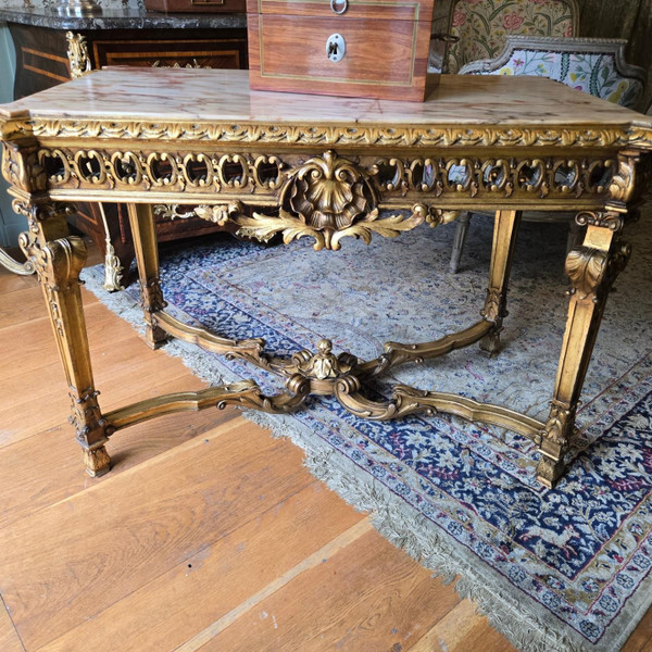 Table de milieu de style Louis XIV en bois doré, époque XIXème.