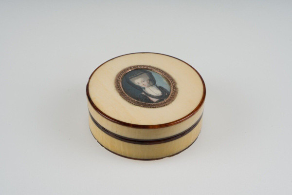 18th-century tortoiseshell box decorated with a miniature of a woman wearing a headdress