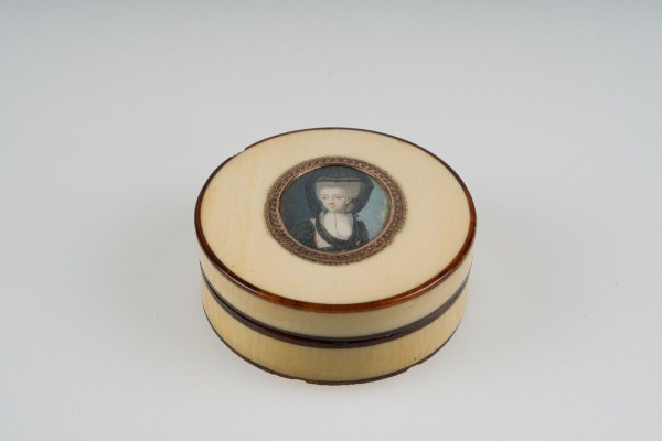 18th-century tortoiseshell box decorated with a miniature of a woman wearing a headdress