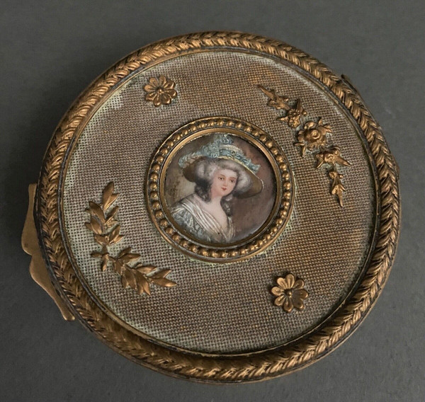 Napoleon III bronze box decorated with a miniature of an 18th-century woman.