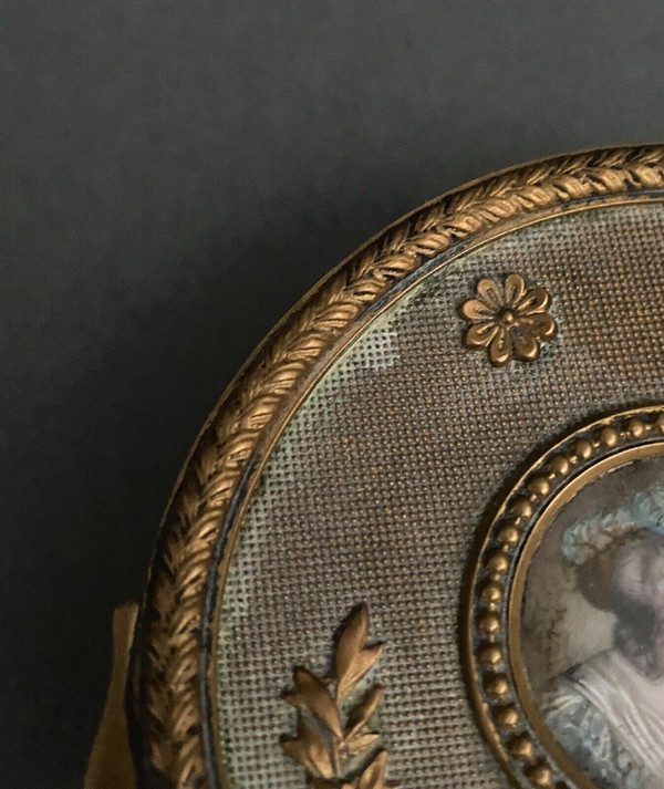 Napoleon III bronze box decorated with a miniature of an 18th-century woman.