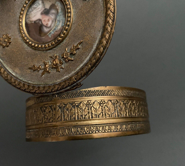 Napoleon III bronze box decorated with a miniature of an 18th-century woman.