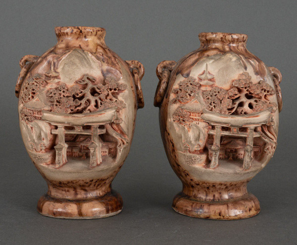 Pair of Chinese Banko Ware ceramic vases with temple and pagoda decoration