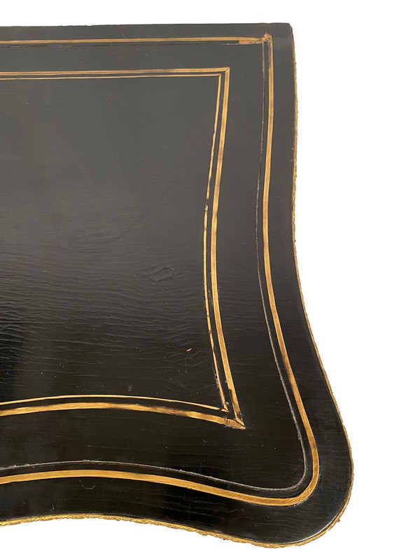 Napoleon III console forming a games table, blackened wood and brass marquetry