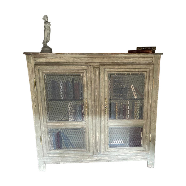 Late 19th century patinated wooden bookcase with trompe l’oeil