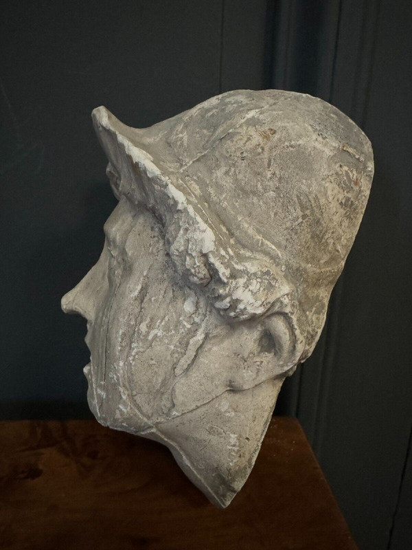 Antique plaster sculpture of a female face from the early 20th century