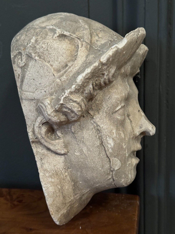 Antique plaster sculpture of a female face from the early 20th century