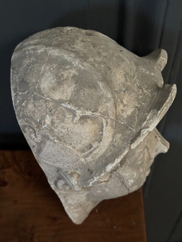 Antique plaster sculpture of a female face from the early 20th century