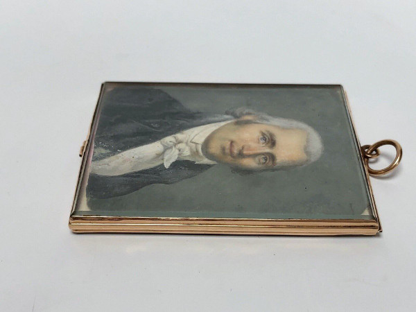 Eighteenth- and early nineteenth-century miniature of a man in a frock coat, hand-painted with hair.