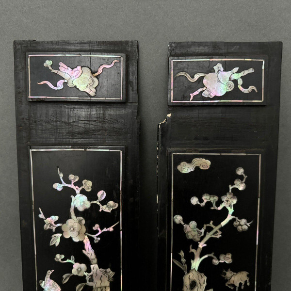 Pair of China panels in blackened wood inlaid with mother-of-pearl