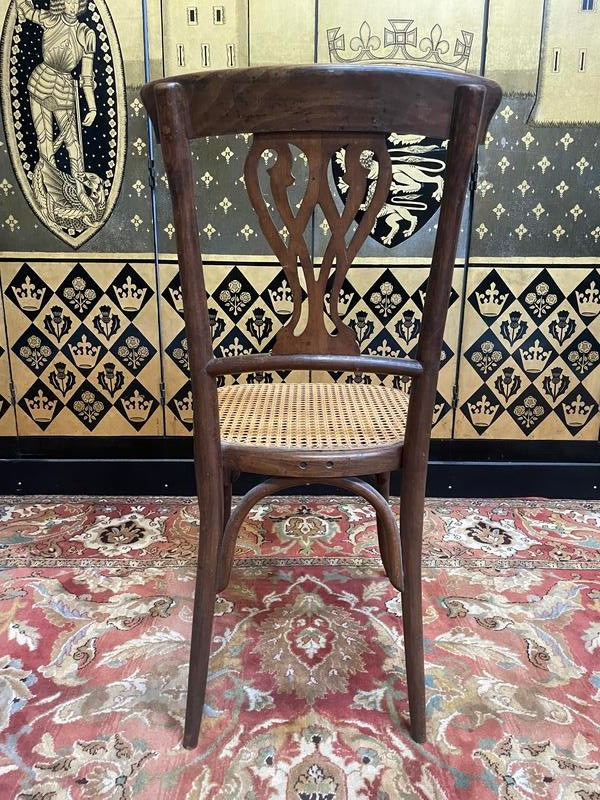 Set of 7 Baumann / Thonet / Fischel caned bistro chairs