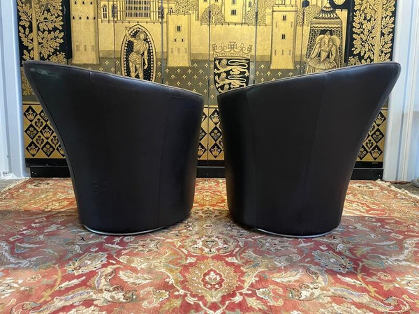 Pair of leather swivel armchairs by BRETZ