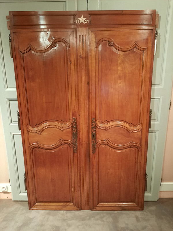 Pair of Louis XV cherrywood doors from the early 19th century.