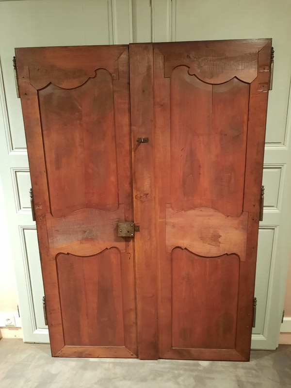 Pair of Louis XV cherrywood doors from the early 19th century.