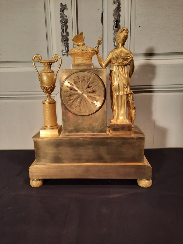 Empire period gilt bronze clock on the theme of peace and fidelity.