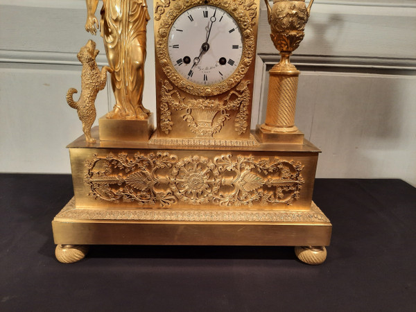 Empire period gilt bronze clock on the theme of peace and fidelity.