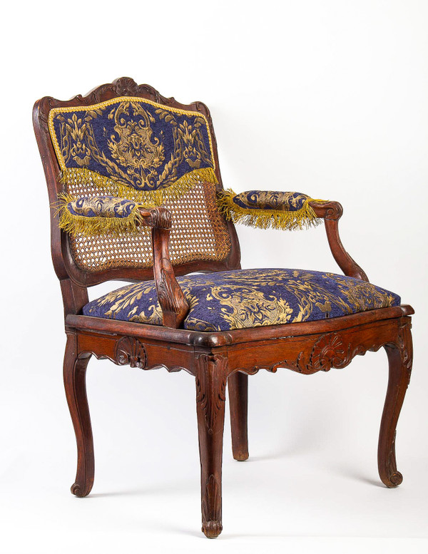 French Régence Period Hand-Carved Wood and Caned Armchair Circa 1720